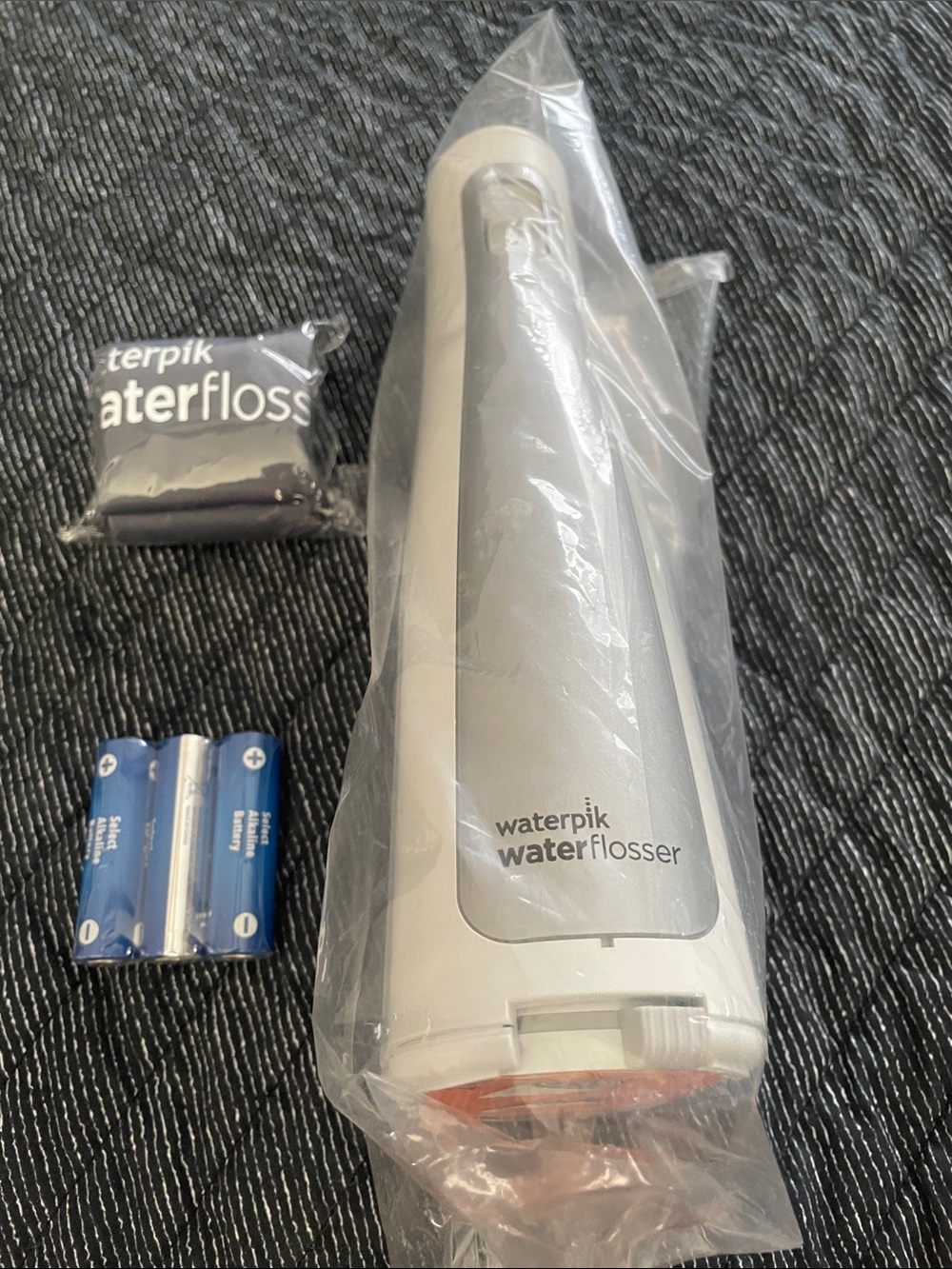Waterpik Wireless Water Flosser - White and Silver Portable Oral Irrigator